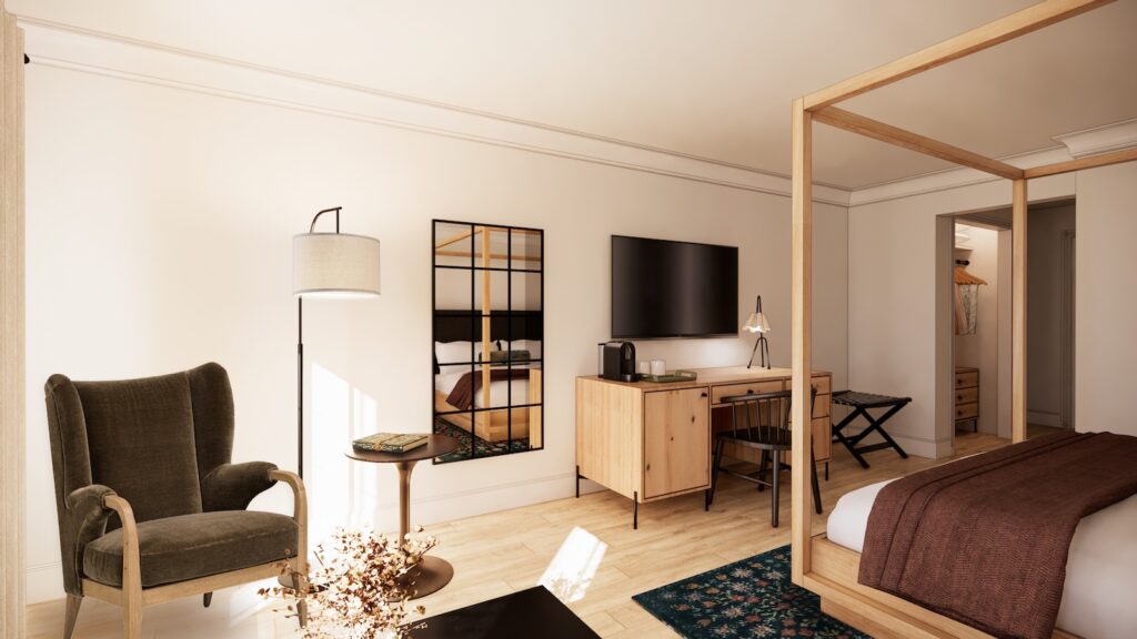 Modern hotel room with a canopy bed, desk, large wall-mounted TV, armchair, standing lamp, and mirrored wall. Neutral tones and wood furniture create a minimalist, inviting atmosphere.